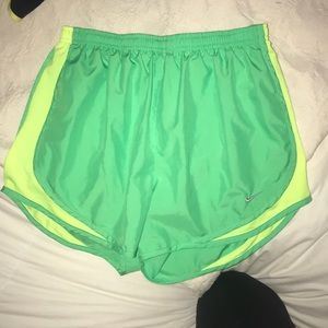 neon green and yellow nike shorts